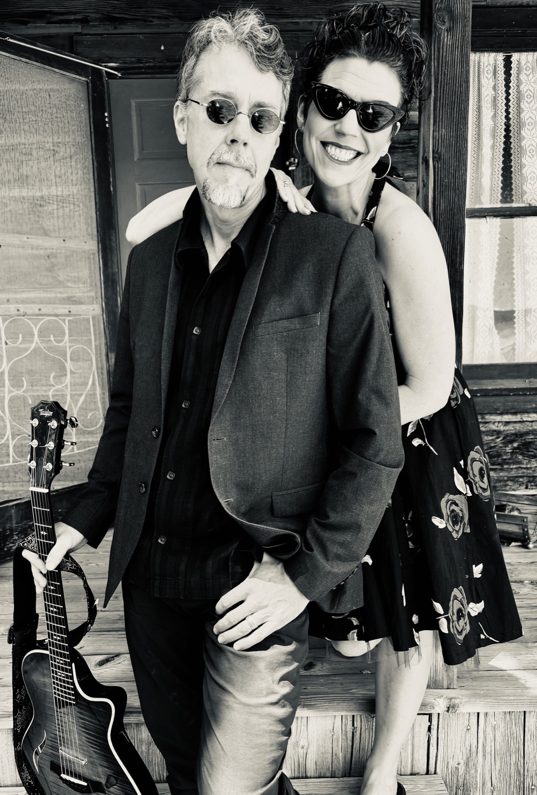 Jackie Jae and Jason Cowsill — black and white porch portrait