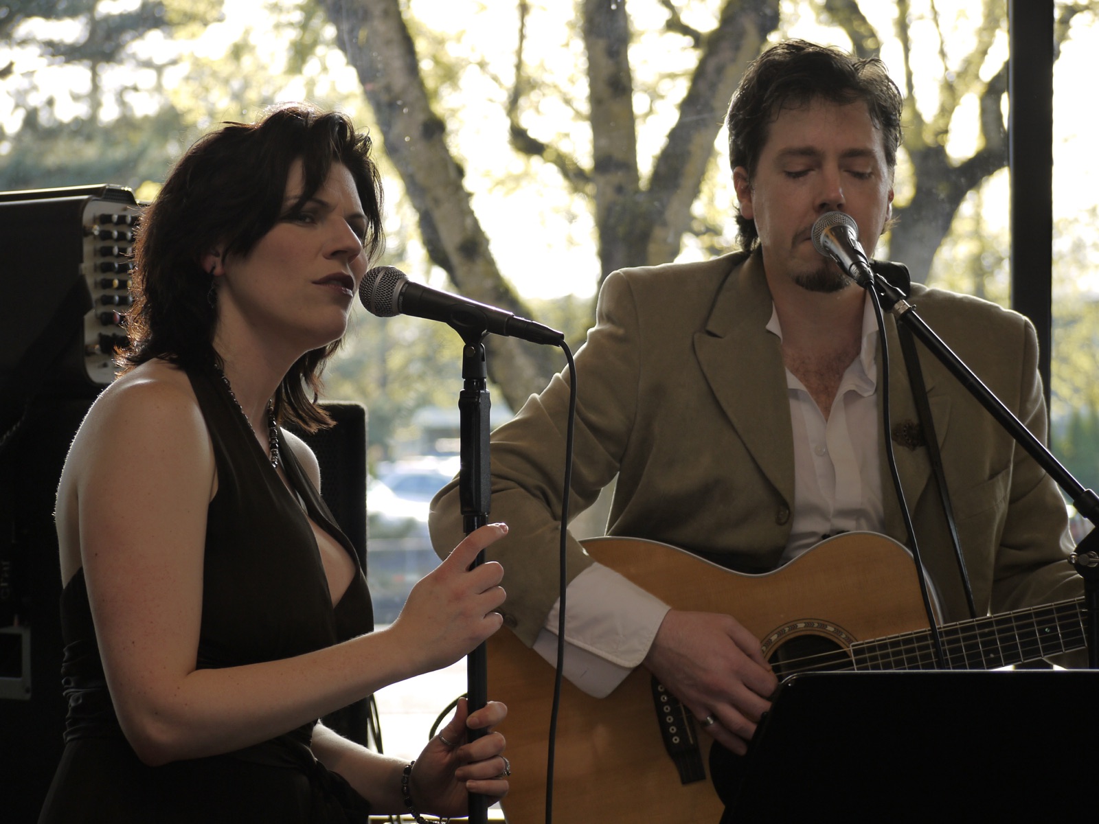 Jackie and Jason performing — intimate venue close-up